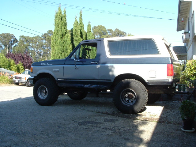 of course, taking out the wedge blocks made my rear end sit about 1-2" lower. so now its off to the junkyard to get some more leafs.