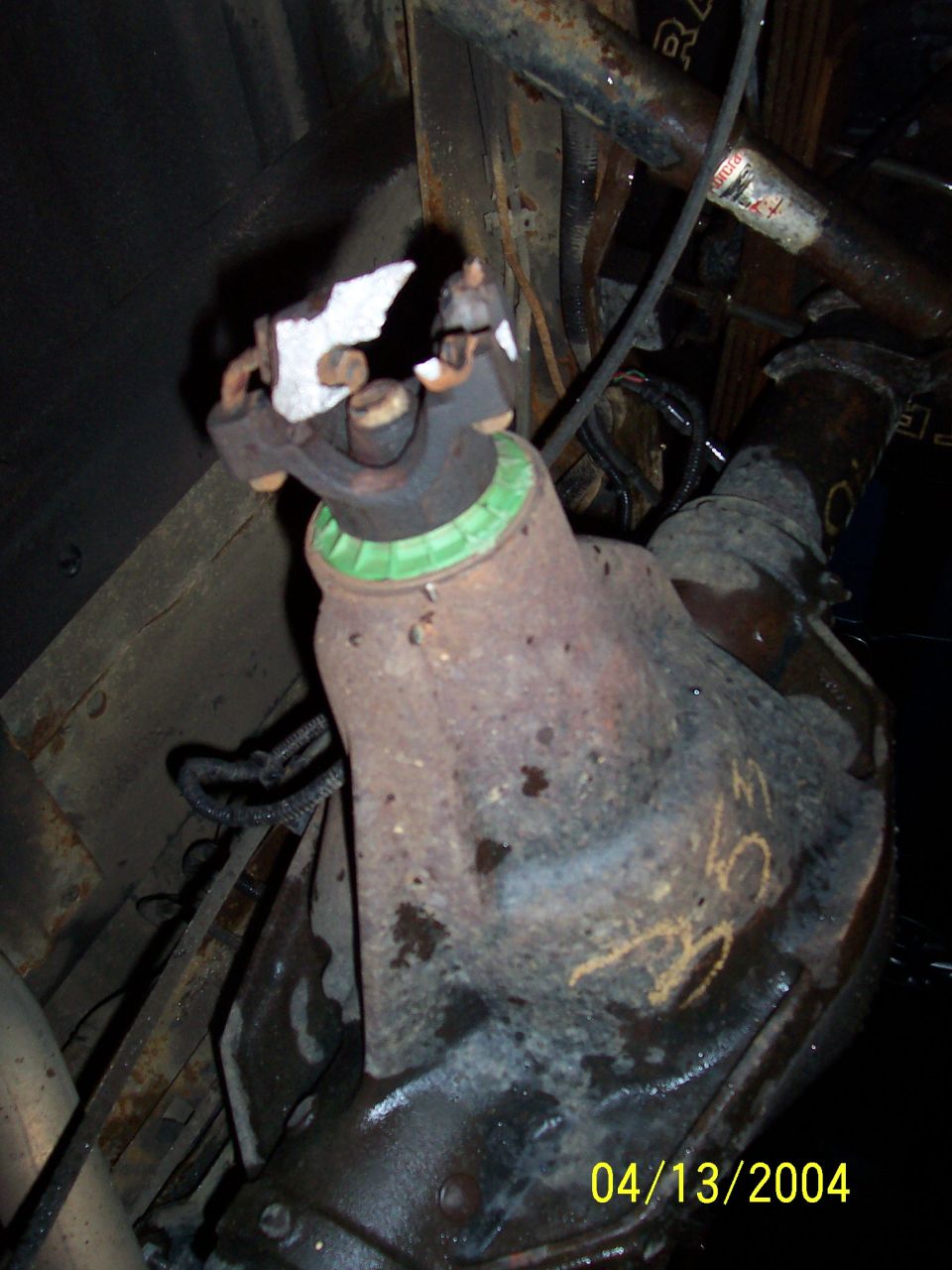 Broken universal joint yoke with green seal
