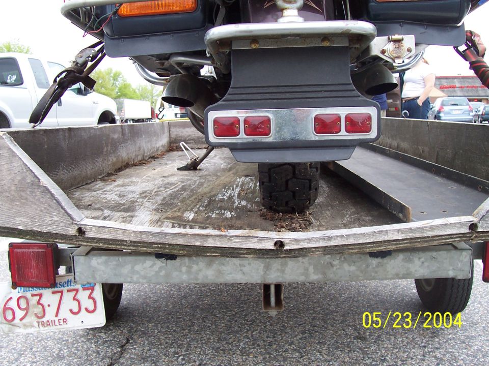 Motorcycle rear on trailer, Massachusetts license plate 693-733, date 05/23/2004