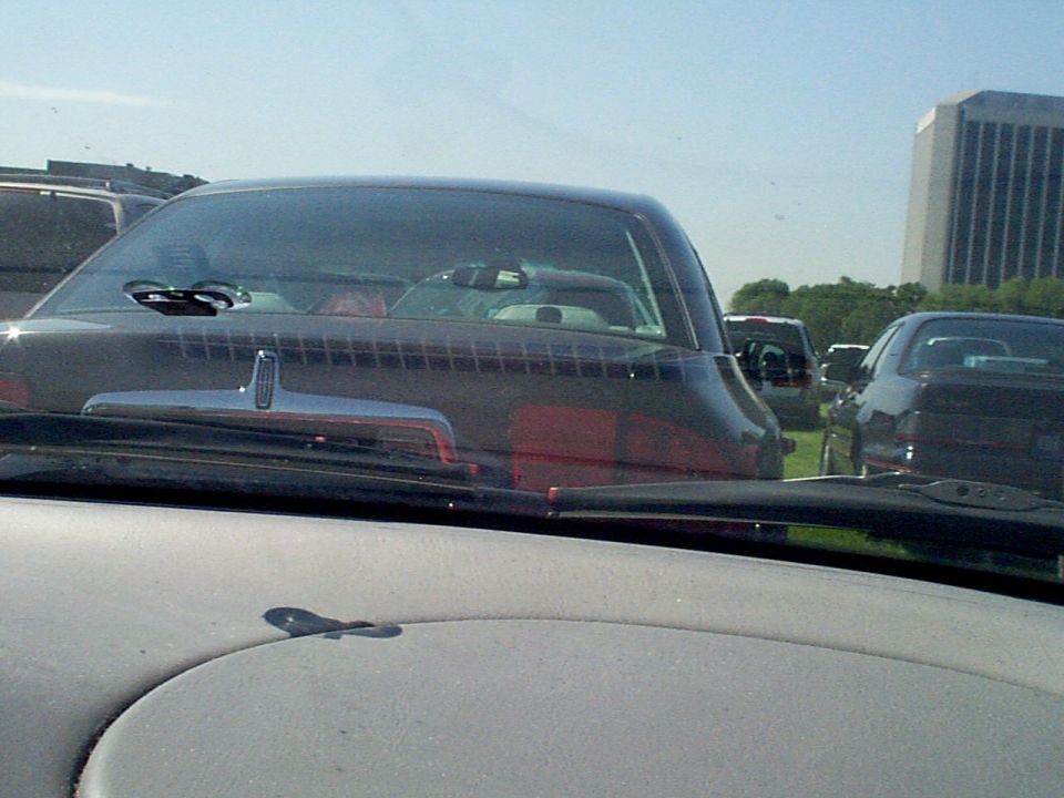 view from 98 Taurus SE in parking lot of Ford Centinial Bash