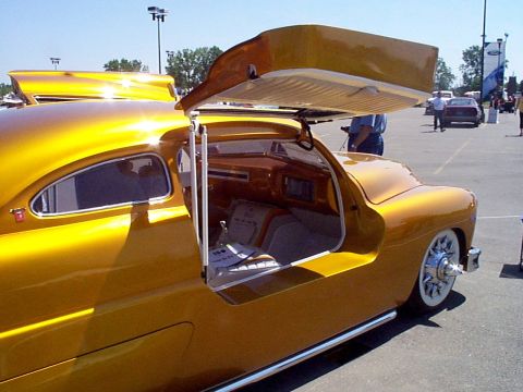 1999 Ford Taurus - This heavily modified classic car features unique gullwing doors and a custom interior.