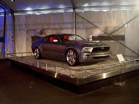 1999 Ford Taurus - This gray coupe with a red interior appears to be a 2005 model, not the 1999 Ford Taurus listed in the registry.