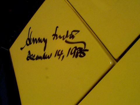 1999 Ford Taurus - A handwritten autograph and date are visible on a yellow panel.