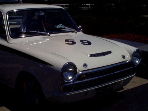 1999 Ford Taurus - This vintage race car has the number 59 displayed prominently on its hood.