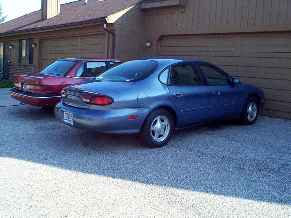99SE parked next to our non running 90 Tempo GL 2.3L HSC atx