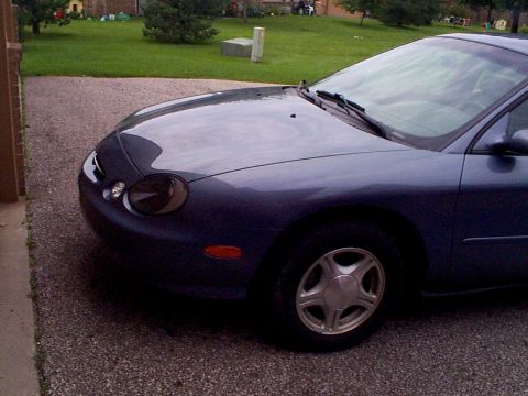 1999 Ford Taurus - This 1999 Ford Taurus is seen from the front quarter angle, showing its dark blue exterior.