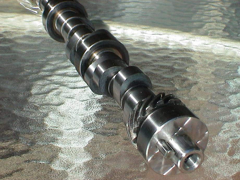 Performance camshaft with polished journals and lobes on a foil surface
