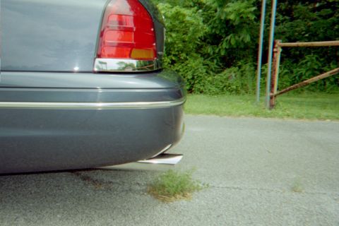 1998 Ford Crown Victoria - The rear of a 1998 Ford Crown Victoria shows its distinctive taillight and chrome trim.