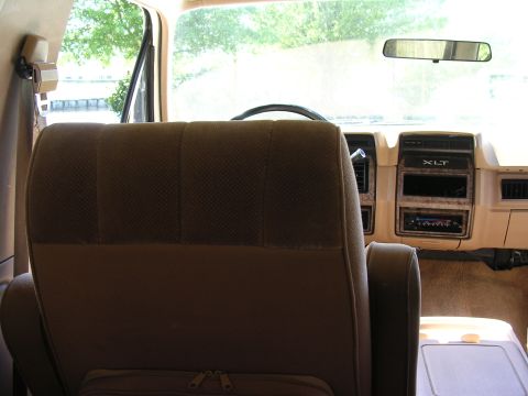 1985 Ford Bronco - The interior of a 1985 Ford Bronco, the XLT trim package and brown upholstery.
