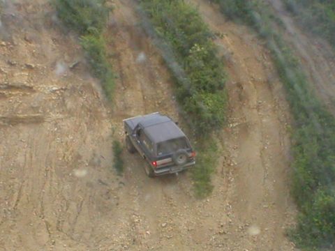 1986 Ford Bronco - Mosley sliding down a tuff hill