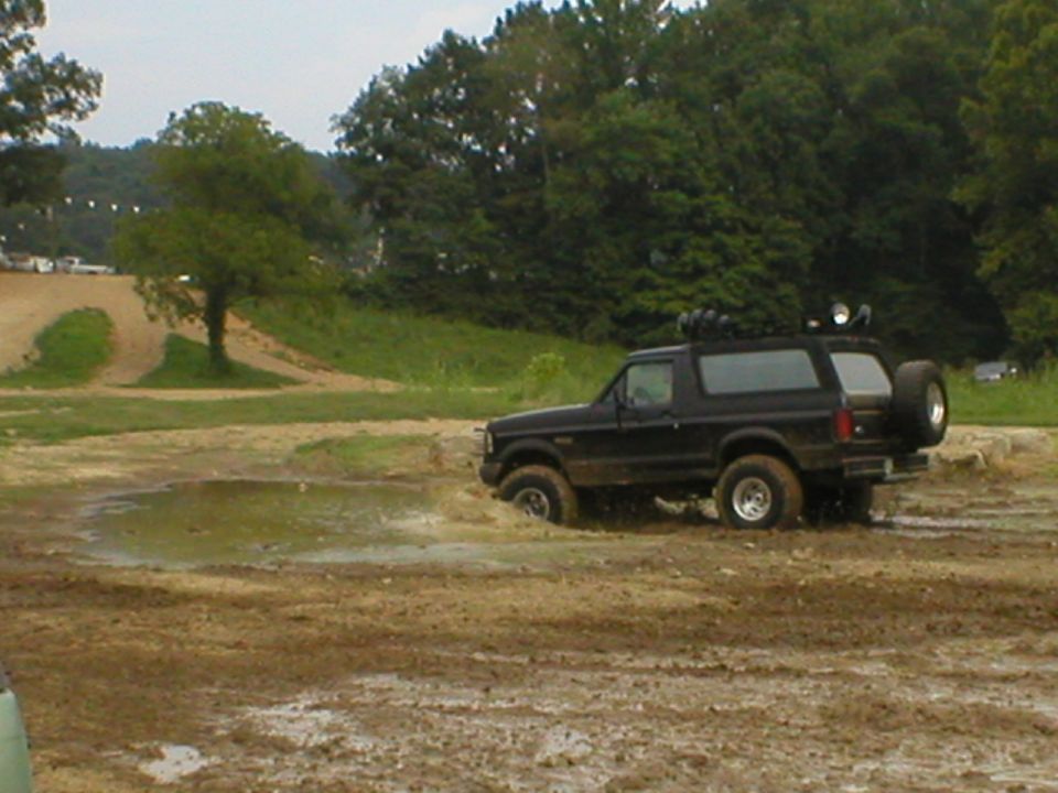 Mark and Alex playing in the mud