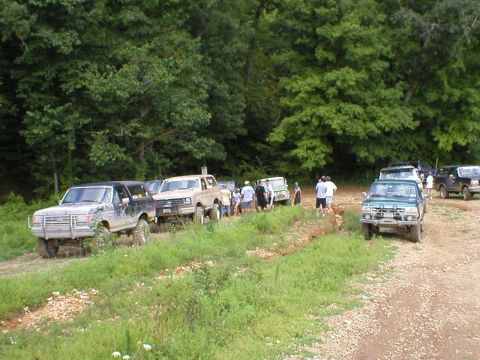 1986 Ford Bronco - Take'n a break and checking out Wojo's rig. He sheared his front drive shaft.