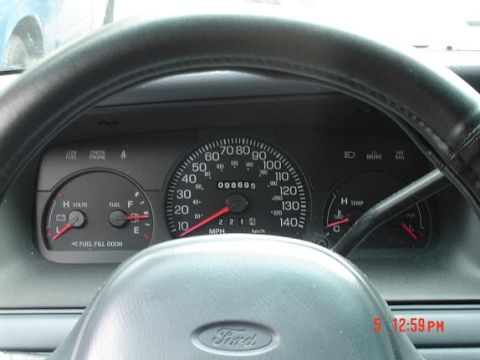 1999 Ford Crown Victoria - Interior view of a 1999 Ford Crown Victoria's dashboard gauges.