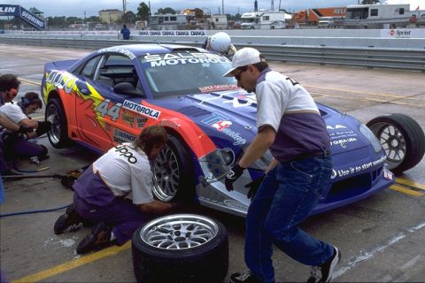 1995 Ford Mustang - Pit crew works on a race car during a stop at Sebring in March 2000.