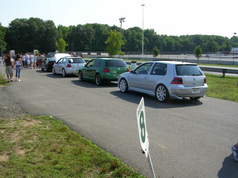 1990 Jeep YJ - Volkswagen Golfs gathered at a track event, with spectators present.