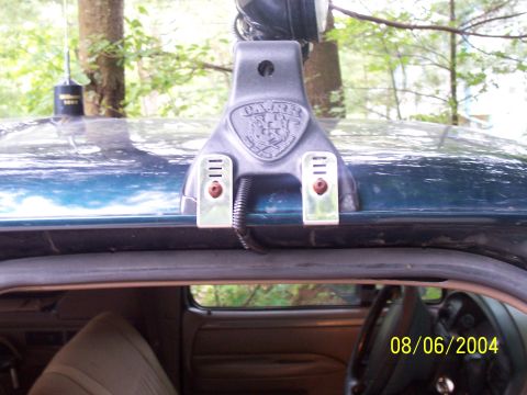 1994 Ford Bronco - Close-up of a light bar mount on a vehicle roof, with the 'CARR' logo visible.