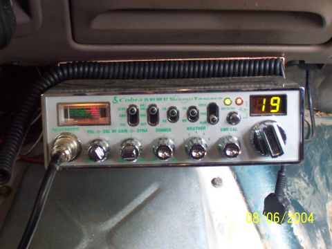 1994 Ford Bronco - A Cobra 25 LTD NW ST Sound Tracker CB radio is mounted in a vehicle's interior.