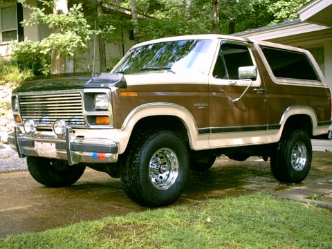 1984 Ford Bronco - This two-tone 1984 Ford Bronco is shown in a three-quarter front view.