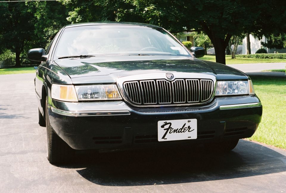 Front view of a 1998 Mercury Grand Marquis with a Fender license plate