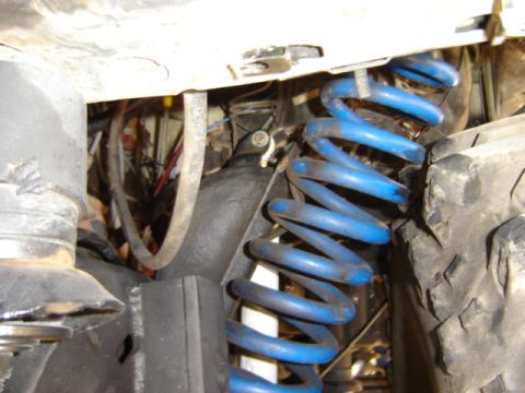 1991 Ford Bronco - Here is where the coil poped out! I guess I forgot to put the retainer bolt in the middle of it to hold it in place.