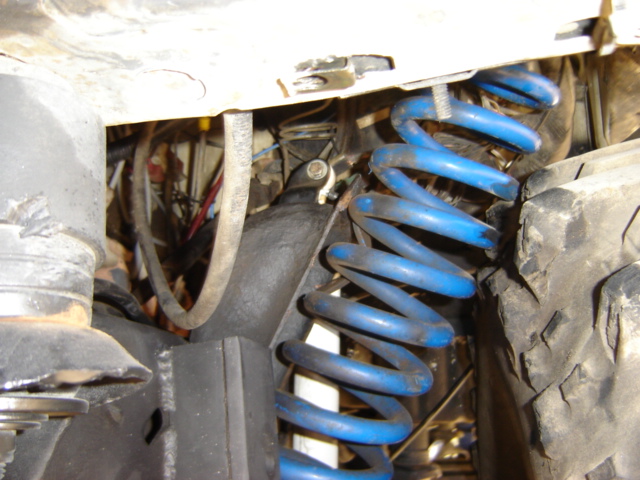 Here is where the coil poped out! I guess I forgot to put the retainer bolt in the middle of it to hold it in place.
