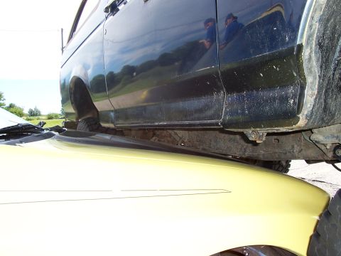 1989 Ford Bronco - Side profile of a 1989 Ford Bronco, highlighting its body and frame structure.