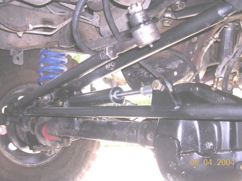 1994 Ford Bronco - Close-up of steering components and suspension, with a date stamp of 08.04.2004 visible.