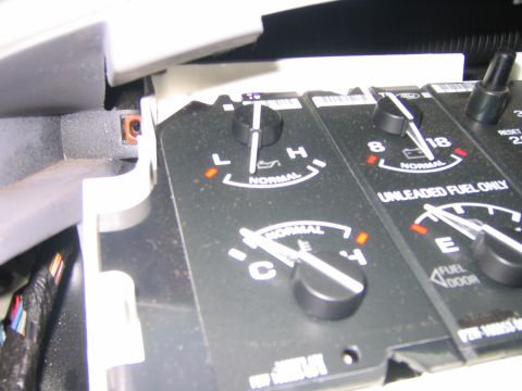 1995 Ford Bronco - Dashboard gauges of a 1995 Ford Bronco, showing oil pressure and fuel levels.