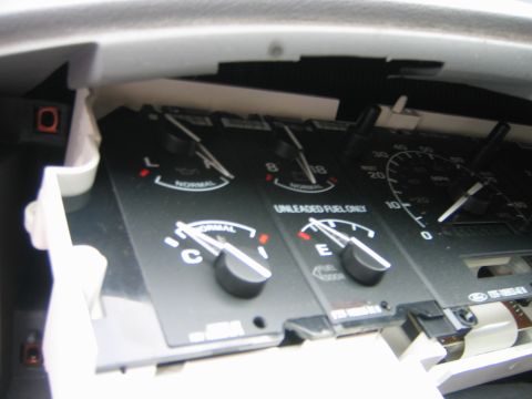 1995 Ford Bronco - Close-up of a vehicle's instrument cluster, showing various gauges and indicators.
