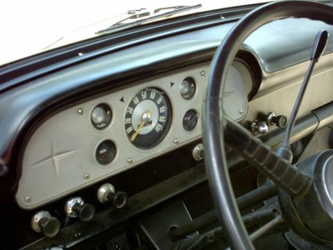 1954 Ford F-100 - Interior view of a 1956 Ford F-100, highlighting the dashboard instrumentation and steering wheel.