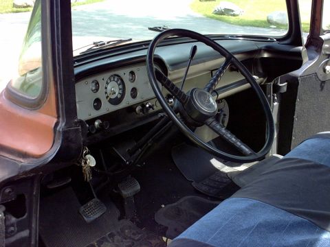 1954 Ford F-100 - Dashboard and interior of a classic Ford F-series truck, likely from the early 1950s.