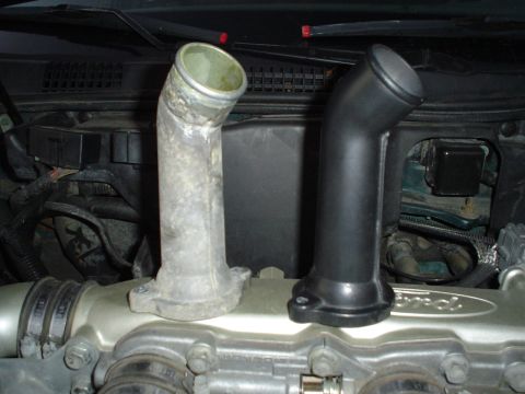1993 Ford Taurus - My smoothed, painted, thermostat housing compared with the original.