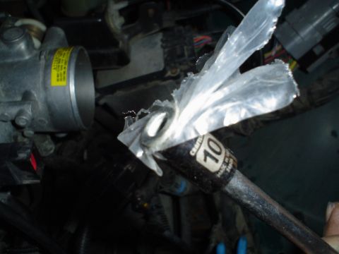 1993 Ford Taurus - The trick to not dropping the nuts.. put some platic in to close the gap.. and use the expensive version of craftman's lineup.