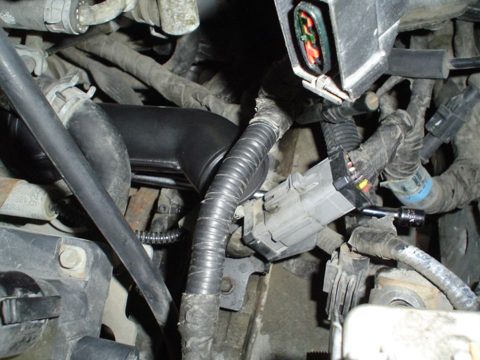 The thermostat housing is installed.