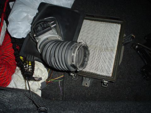 1993 Ford Taurus - Storage is in the trunk... just for the filter though.
