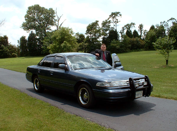 Me and my 96.  I've blacked out the exterior chrome (minus the grill and wheels) and tinted the windows.