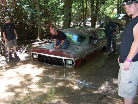 1995 Ford Bronco - Mike sunk his rig right after Kev did in the same hole. Will's looking for the good ol' winch cable