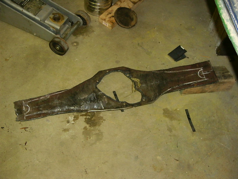 Damaged metal part with white markings