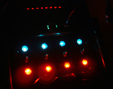 1996 Ford Crown Victoria - The console lit up at night. The blue lights go on w/ the headlights (and can be dimmed w/ interior lights)and the reds come on when the sw…