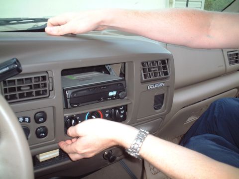 2000 Ford Excursion - Pulling front dash panel off.