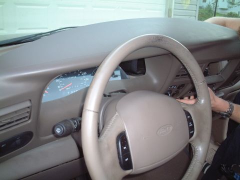 2000 Ford Excursion - Removing dash panel (transmission shifter must be down in 1st gear to remove this panel completely).