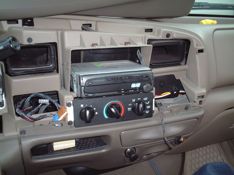 Dash panel removed.  I have an LED wired into the front dash panel without quick disconnects which makes the dash panel hard to place anywhere else other than on top of the dash.  This works out to be a nice area because it gets it up and out of the way.