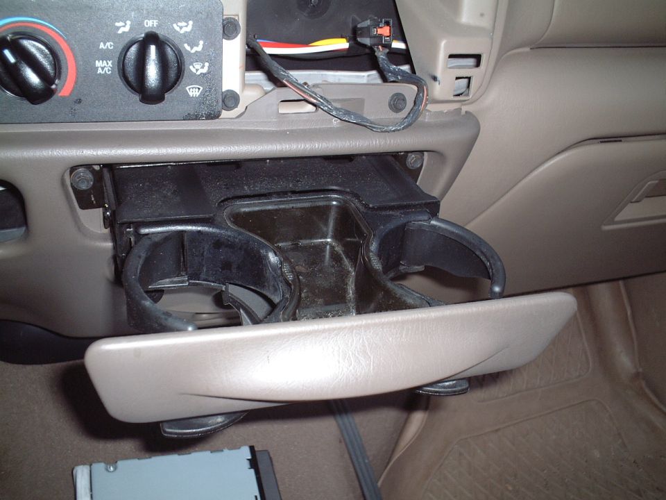 Must remove the cupholder (2 screws) before removing the lower dash panel.