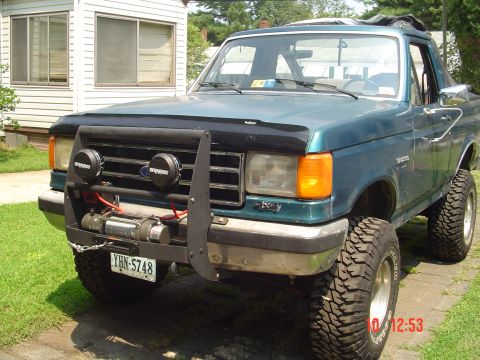 1989 Ford Bronco - This 1987-1991 Ford Bronco is equipped with a winch and off-road tires, suggesting it's ready for adventure.