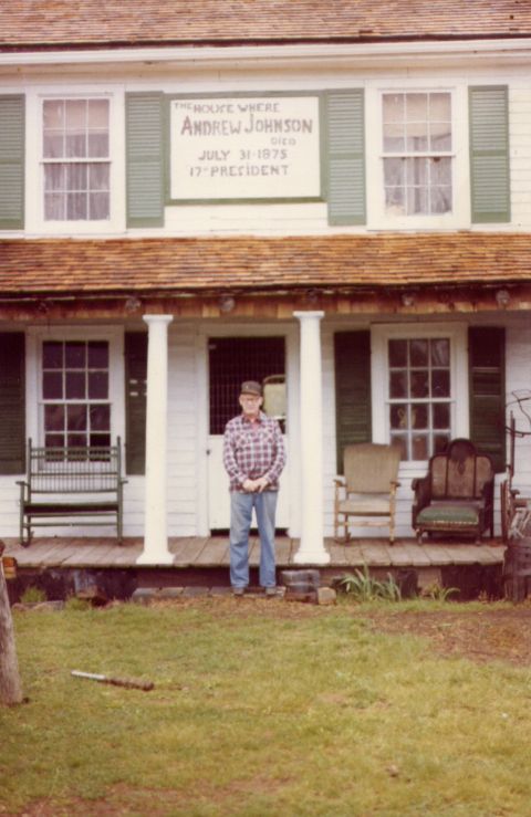1995 Ford Bronco - A man stands on the porch of a historic house marked with a sign detailing Andrew Johnson's death.