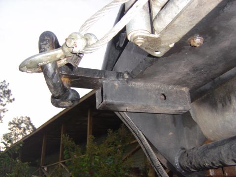 1993 Ford Bronco - Detail of a vehicle's undercarriage, focusing on the tow hitch and winch mechanism.