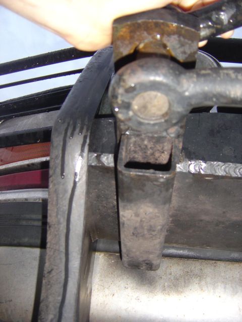 1993 Ford Bronco - Close-up view of a brushguard mount, showing welded construction.