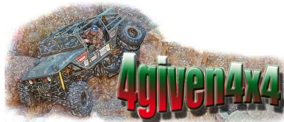 Custom off-road vehicle with roll cage climbing rocky terrain