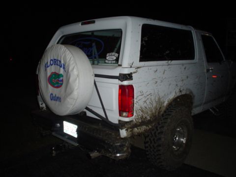 1993 Ford Bronco - This 1993 Ford Bronco is covered in mud, with a spare tire cover displaying the Florida Gators logo.