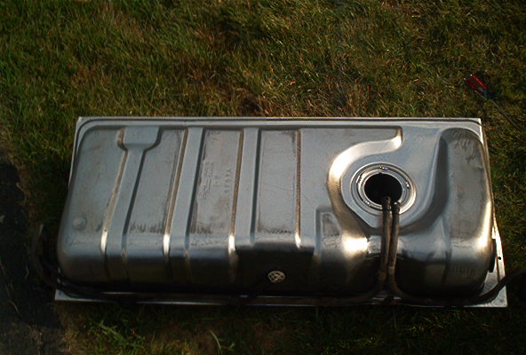 Fuel tank with visible stamped text